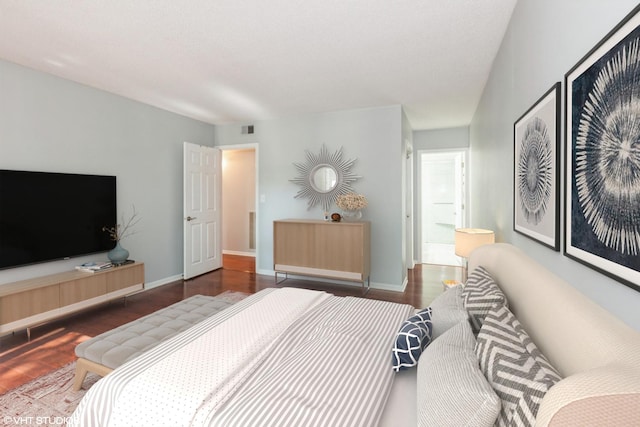 509 Aurora Ave Unit 305, Naperville, IL 60540 - bedroom with wood finished floors and baseboards