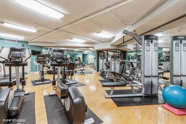 509 Aurora Ave Unit 305, Naperville, IL 60540 - exercise room with wood finished floors