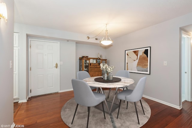 509 Aurora Ave Unit 305, Naperville, IL 60540 - dining area with dark wood finished floors and baseboards