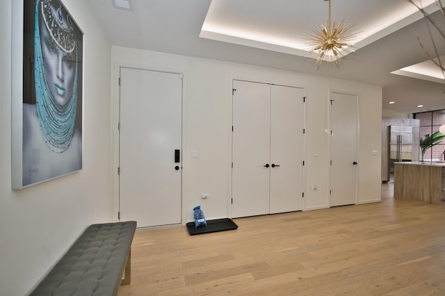 522 N Western Ave Unit 201, Chicago, IL 60612 - foyer featuring light wood-type flooring and a chandelier