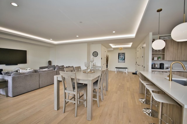 522 N Western Ave Unit 201, Chicago, IL 60612 - dining room with a raised ceiling, light wood-type flooring, and recessed lighting