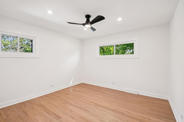 8127 Gross Point Rd, Morton Grove, IL 60053 - spare room with light wood-style floors, ceiling fan, and recessed lighting