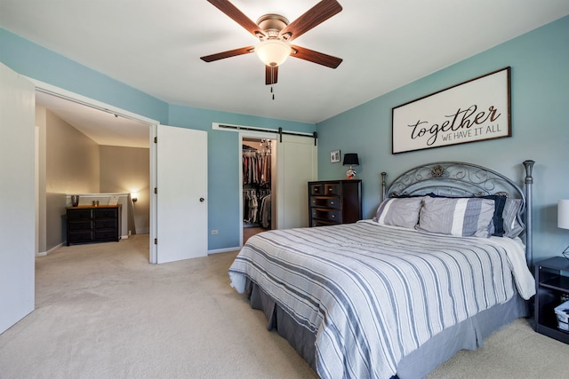 504 N Reef Rd, Lockport, IL 60441 - bedroom featuring carpet floors, a barn door, a walk in closet, a closet, and ceiling fan