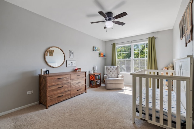 504 N Reef Rd, Lockport, IL 60441 - carpeted bedroom featuring a nursery area and ceiling fan