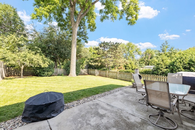 504 N Reef Rd, Lockport, IL 60441 - fenced backyard with a patio, view of wooded area, and outdoor dining space