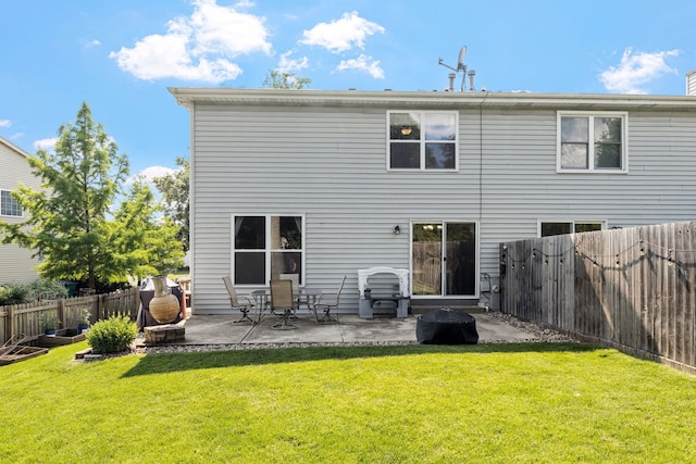 504 N Reef Rd, Lockport, IL 60441 - back of house featuring a patio area and a fenced backyard