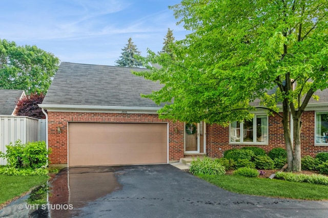 1808 N Normandy Ct, Arlington Heights, IL 60004 - view of front facade with driveway, a garage, brick siding, and a shingled roof