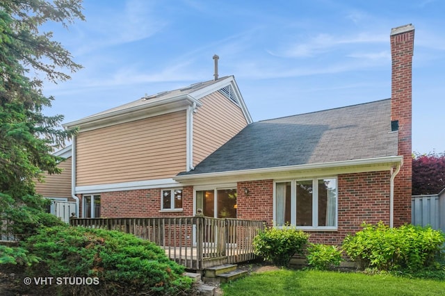 1808 N Normandy Ct, Arlington Heights, IL 60004 - rear view of house with a chimney, a deck, brick siding, and roof with shingles