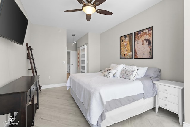 233 E 13th St Unit 2402, Chicago, IL 60605 - bedroom featuring a ceiling fan and light wood-style flooring