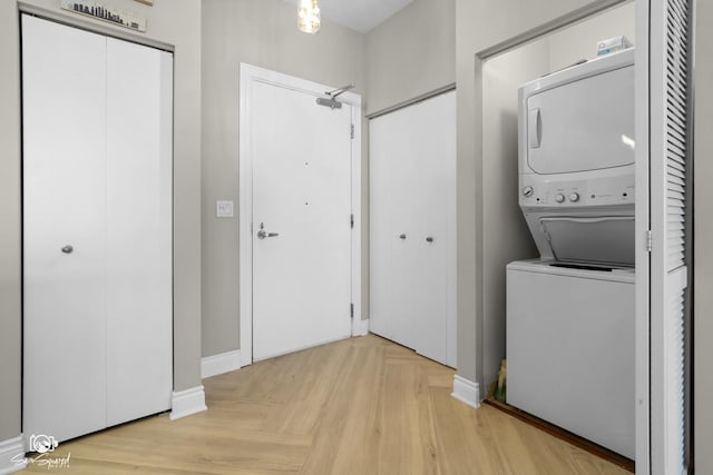 233 E 13th St Unit 2402, Chicago, IL 60605 - laundry room with stacked washer / drying machine and parquet floors