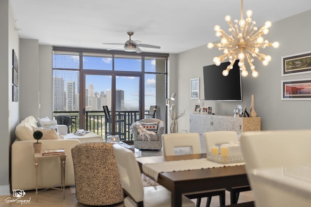 233 E 13th St Unit 2402, Chicago, IL 60605 - living area featuring ceiling fan, a chandelier, wood finished floors, and a wall of windows