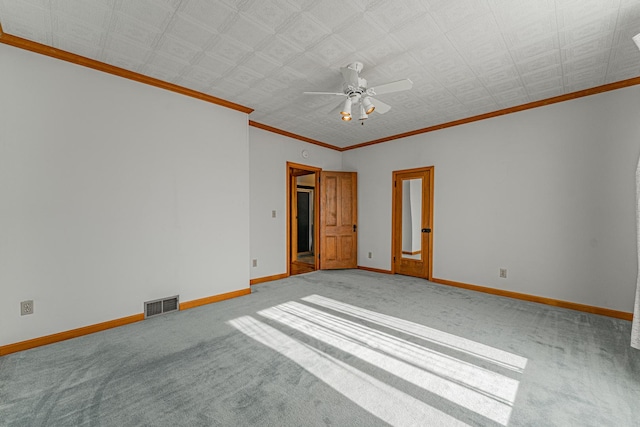 102 S Oak St, Arrowsmith, IL 61722 - carpeted spare room with a ceiling fan and crown molding