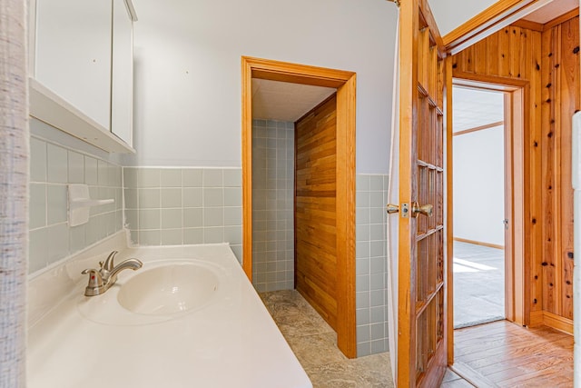 102 S Oak St, Arrowsmith, IL 61722 - bathroom with tile walls and a wainscoted wall