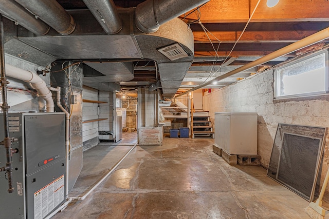 102 S Oak St, Arrowsmith, IL 61722 - basement featuring stairway and heating unit