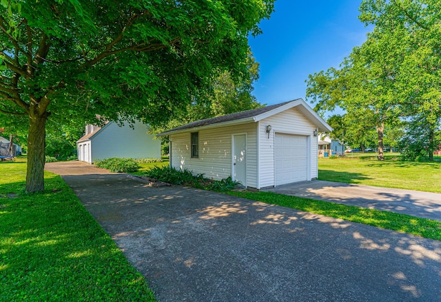 102 S Oak St, Arrowsmith, IL 61722 - detached garage featuring driveway