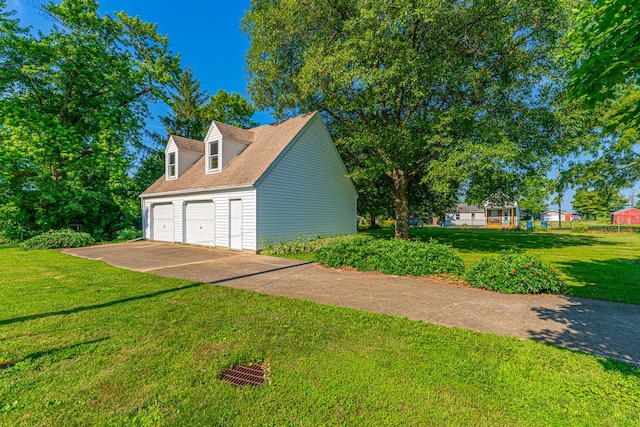 102 S Oak St, Arrowsmith, IL 61722 - view of home's exterior featuring a garage and a lawn
