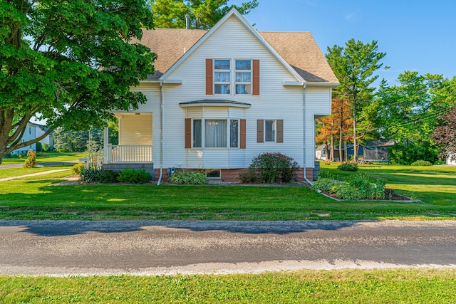 102 S Oak St, Arrowsmith, IL 61722 - view of front of house with a front yard and a shingled roof