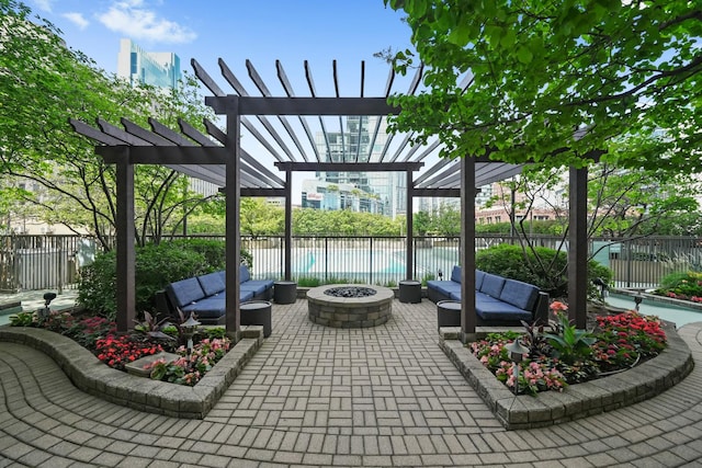 400 N Lasalle Dr Unit 2007, Chicago, IL 60654 - fenced backyard with a pergola, an outdoor living space with a fire pit, a patio, and a water view