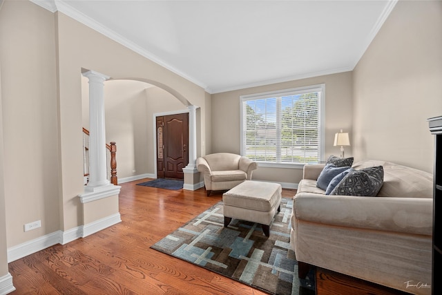 4037 Main St, Downers Grove, IL 60515 - living room with decorative columns, arched walkways, wood finished floors, and ornamental molding