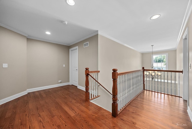 4037 Main St, Downers Grove, IL 60515 - corridor with an upstairs landing, recessed lighting, wood finished floors, and crown molding
