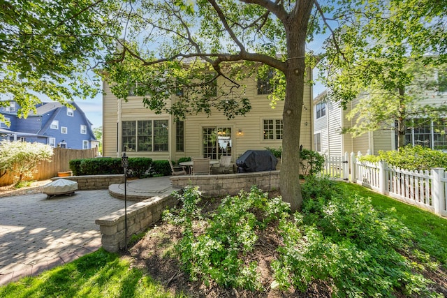 4037 Main St, Downers Grove, IL 60515 - rear view of property featuring a patio area and a fenced backyard