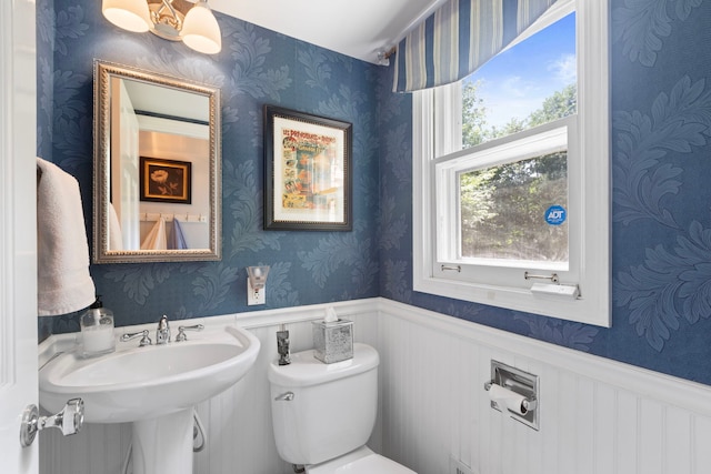 1014 Indian Rd, Glenview, IL 60025 - half bath featuring wallpapered walls and a wainscoted wall