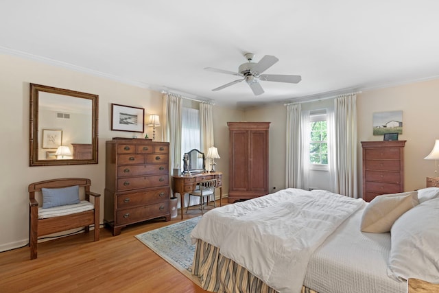 1014 Indian Rd, Glenview, IL 60025 - bedroom with light wood-style floors, ornamental molding, and a ceiling fan