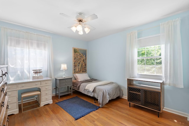 1014 Indian Rd, Glenview, IL 60025 - bedroom with light wood finished floors and ceiling fan
