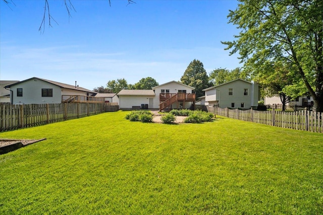 16 Rutherford Ct, Bloomington, IL 61705 - fenced backyard with stairway and a wooden deck
