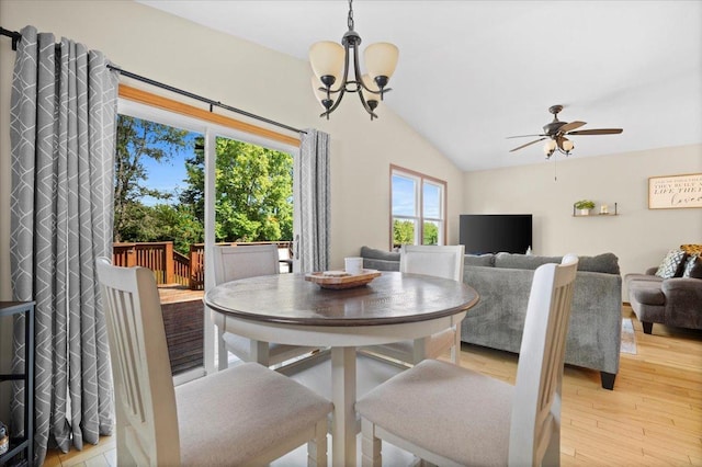 16 Rutherford Ct, Bloomington, IL 61705 - dining space featuring lofted ceiling, light wood finished floors, a chandelier, and ceiling fan