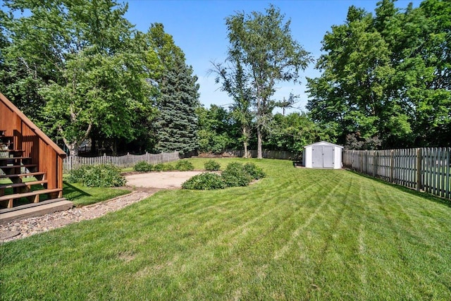16 Rutherford Ct, Bloomington, IL 61705 - fenced backyard with a storage shed and stairs