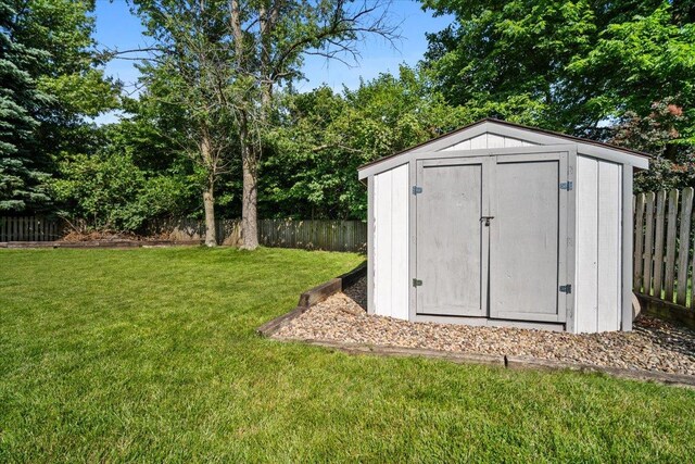 16 Rutherford Ct, Bloomington, IL 61705 - view of shed with a fenced backyard
