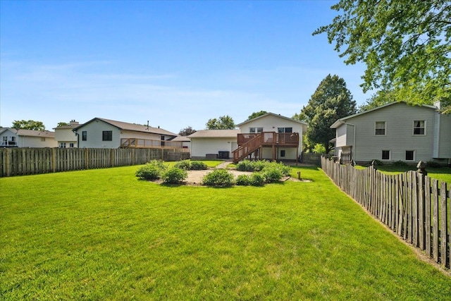 16 Rutherford Ct, Bloomington, IL 61705 - fenced backyard featuring a wooden deck, stairway, and a residential view