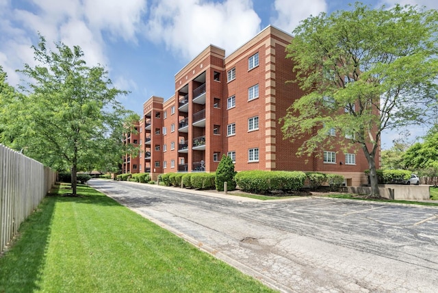 59 S Hale St Unit 402, Palatine, IL 60067 - view of apartment building / complex with uncovered parking