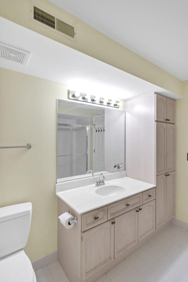 59 S Hale St Unit 402, Palatine, IL 60067 - bathroom featuring vanity, tile patterned flooring, and a shower