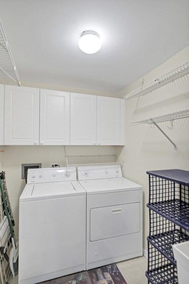 59 S Hale St Unit 402, Palatine, IL 60067 - washroom with washer and clothes dryer and cabinet space
