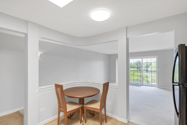 59 S Hale St Unit 402, Palatine, IL 60067 - dining space featuring baseboards and light wood-type flooring