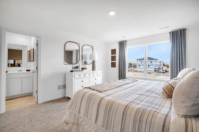 1763 Baler Ln, Aurora, IL 60503 - bedroom featuring light colored carpet and ensuite bath