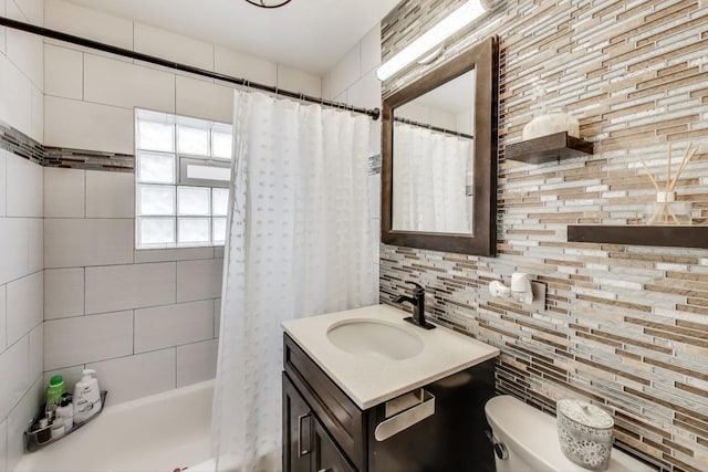 4445 Grove Ave, Stickney, IL 60402 - bathroom with vanity, tasteful backsplash, and shower / bath combo with shower curtain