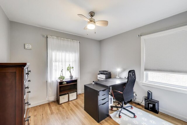4445 Grove Ave, Stickney, IL 60402 - home office with a ceiling fan and light wood-style floors