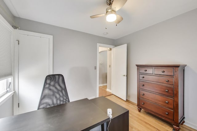 4445 Grove Ave, Stickney, IL 60402 - home office with light wood-style floors and a ceiling fan