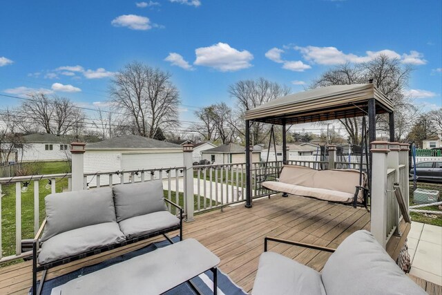4445 Grove Ave, Stickney, IL 60402 - wooden terrace featuring an outbuilding, a residential view, a yard, and an outdoor hangout area
