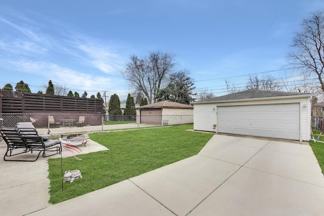 4445 Grove Ave, Stickney, IL 60402 - view of yard featuring an outbuilding and a garage