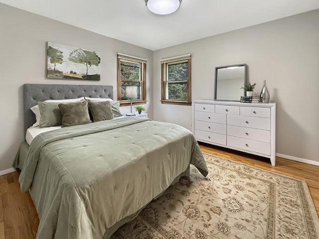 389 Forest Ave, Glen Ellyn, IL 60137 - bedroom with light wood finished floors and baseboards