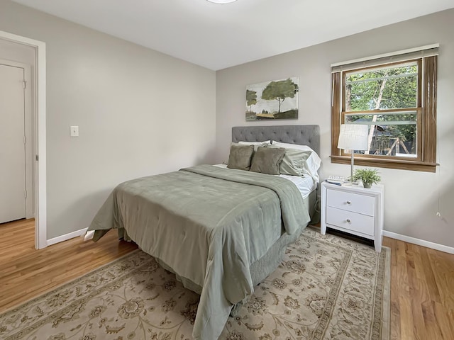 389 Forest Ave, Glen Ellyn, IL 60137 - bedroom featuring wood finished floors and baseboards