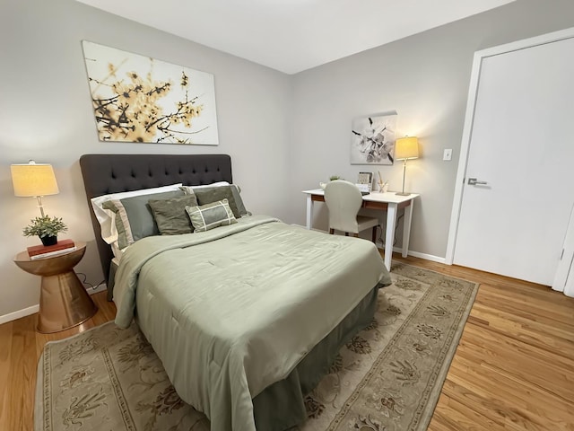 389 Forest Ave, Glen Ellyn, IL 60137 - bedroom with wood finished floors and baseboards