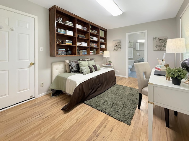389 Forest Ave, Glen Ellyn, IL 60137 - bedroom featuring light wood-type flooring and connected bathroom