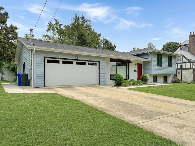 389 Forest Ave, Glen Ellyn, IL 60137 - split level home featuring a garage, driveway, a front yard, and a shingled roof