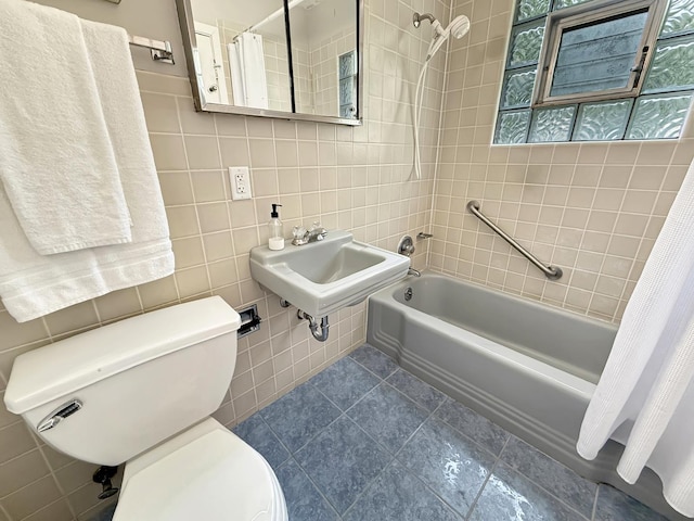389 Forest Ave, Glen Ellyn, IL 60137 - full bathroom featuring tile walls, shower / bath combo, and tile patterned floors
