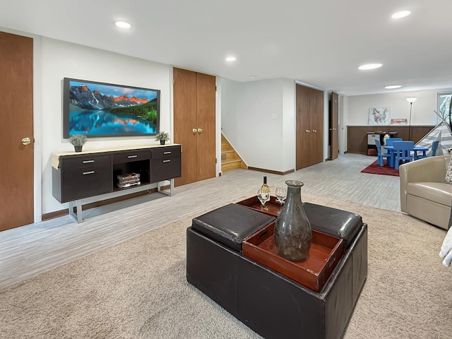 389 Forest Ave, Glen Ellyn, IL 60137 - living room featuring stairs, light carpet, recessed lighting, and light wood finished floors
